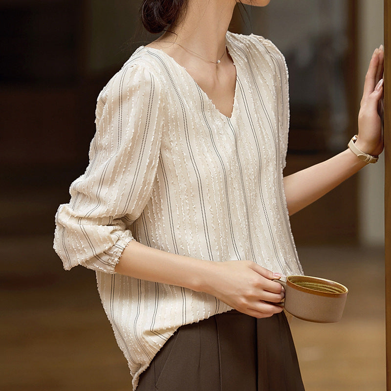 Blusa elegante de cuello texturizado