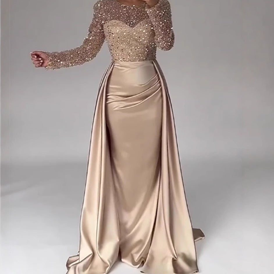 Vestido largo de noche con cuerpo de lentejuelas y falda satinada