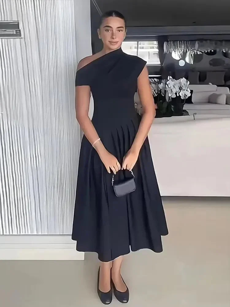Vestido largo evasé de cintura alta con abertura