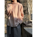 Blusa elegante de manga larga con cuello alto y lazo