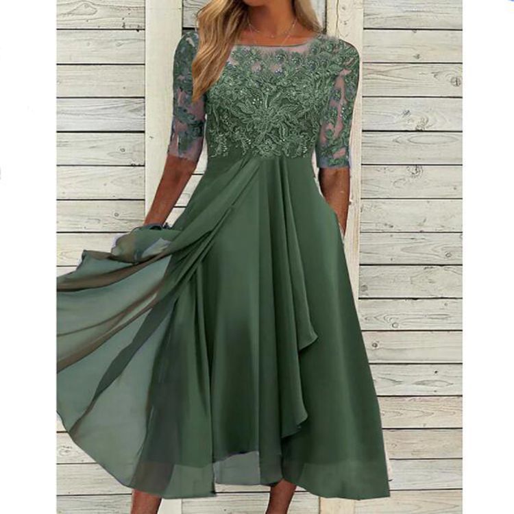 Vestido largo de gasa y encaje con detalles calados