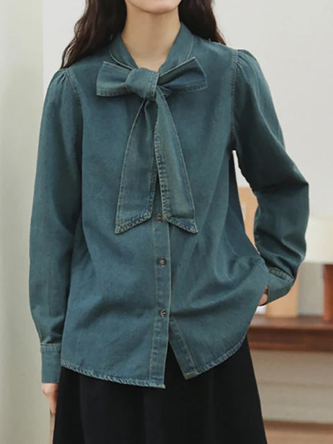 Blusa vaquera elegante con lazo