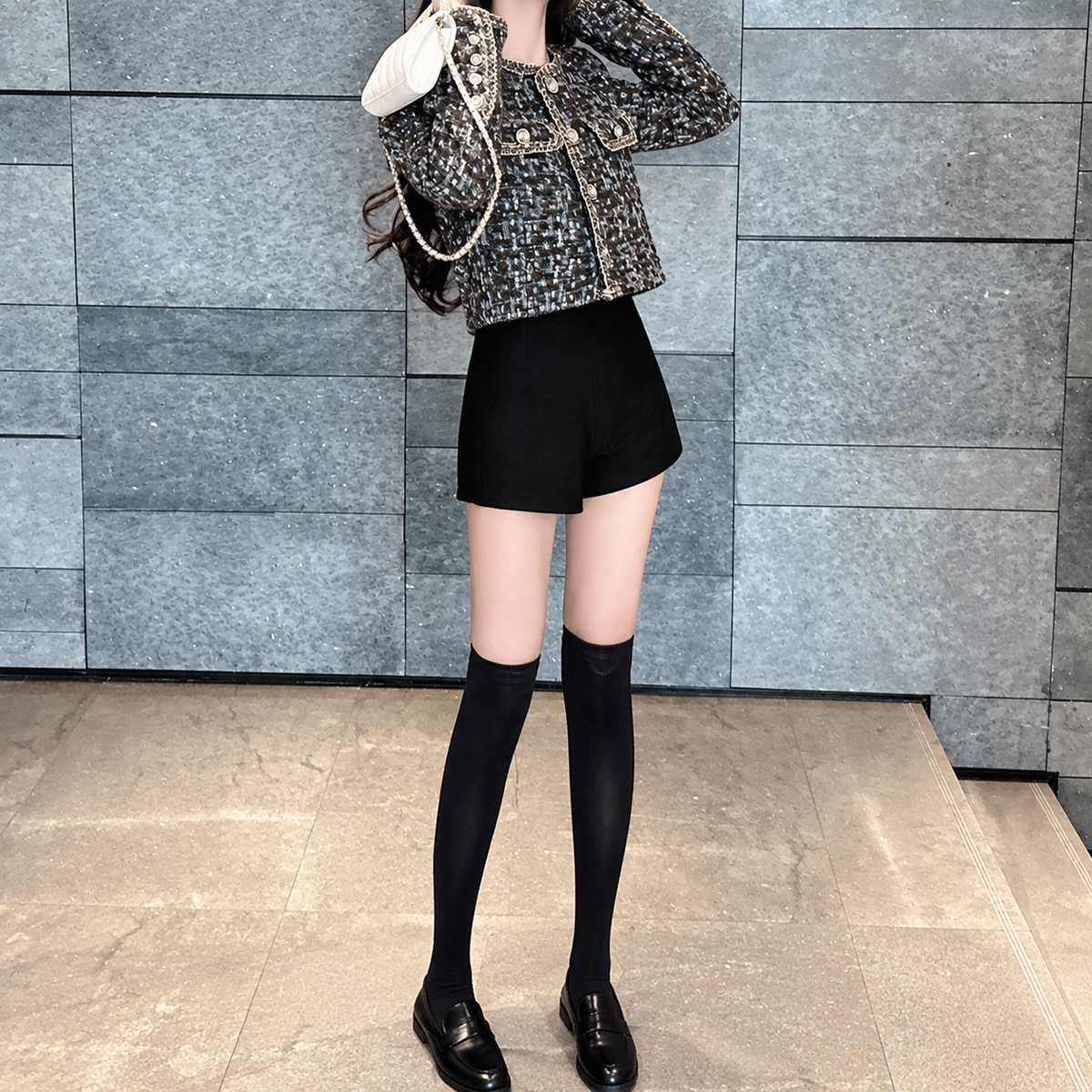 Chaqueta corta de tweed con bolsillos