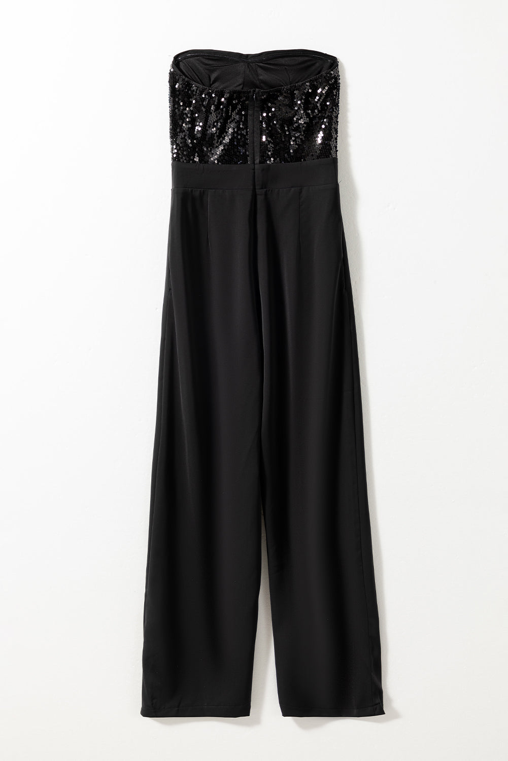 Mono negro de pierna ancha con top de lentejuelas