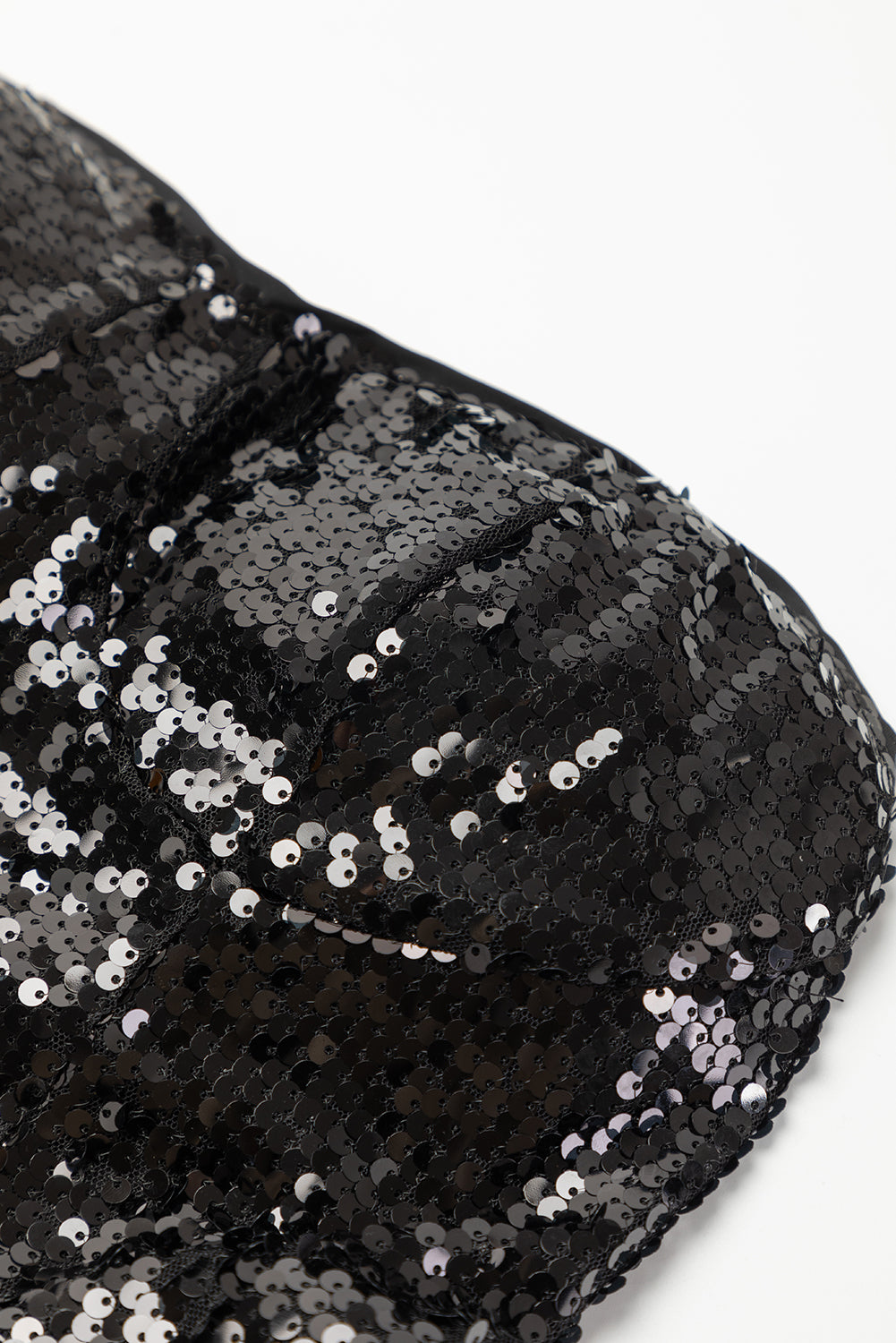Mono negro de pierna ancha con top de lentejuelas